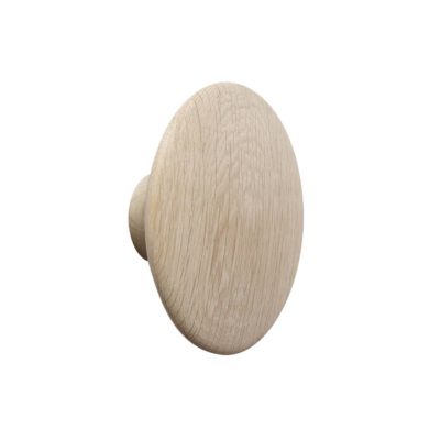 A large, circular, oak wall hook on a white background