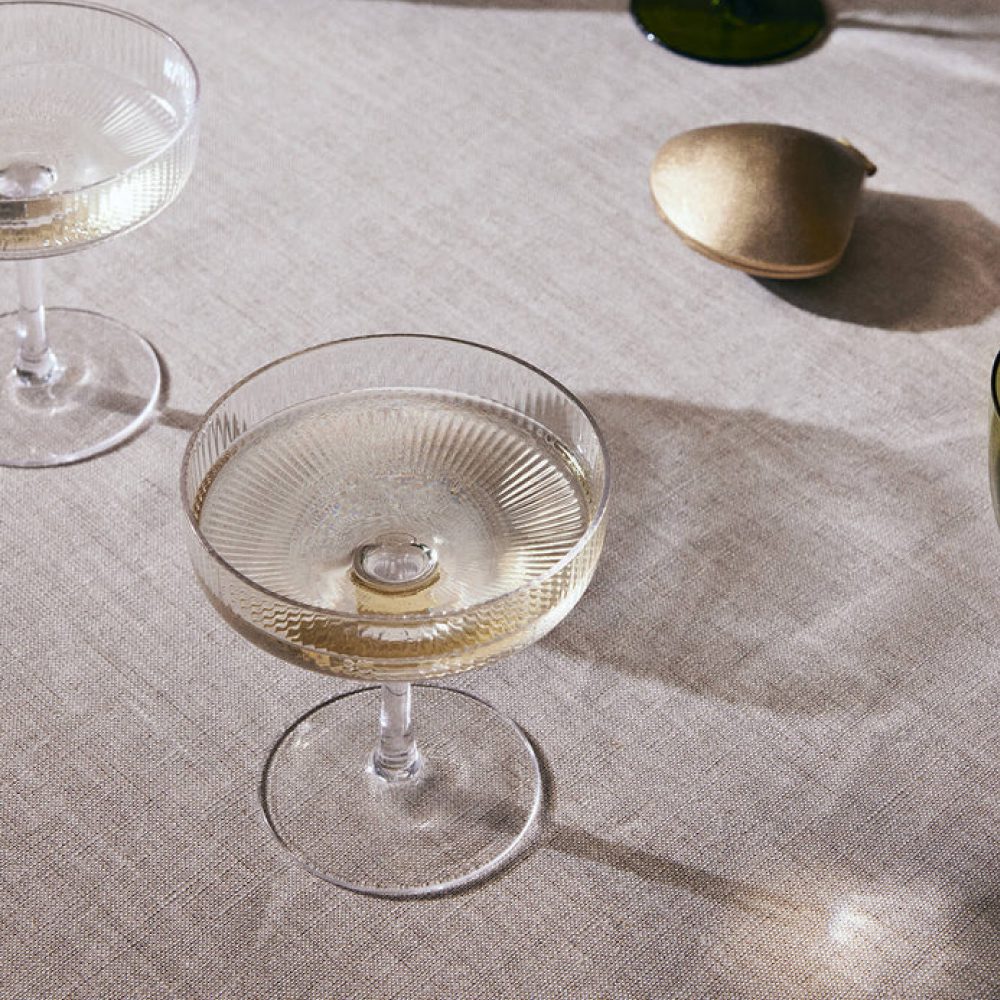 https://www.designstuff.com.au/wp-content/uploads/2017/02/ferm-LIVING-Ripple-Cocktail-Glass-Champagne-Saucers-Clear.jpg