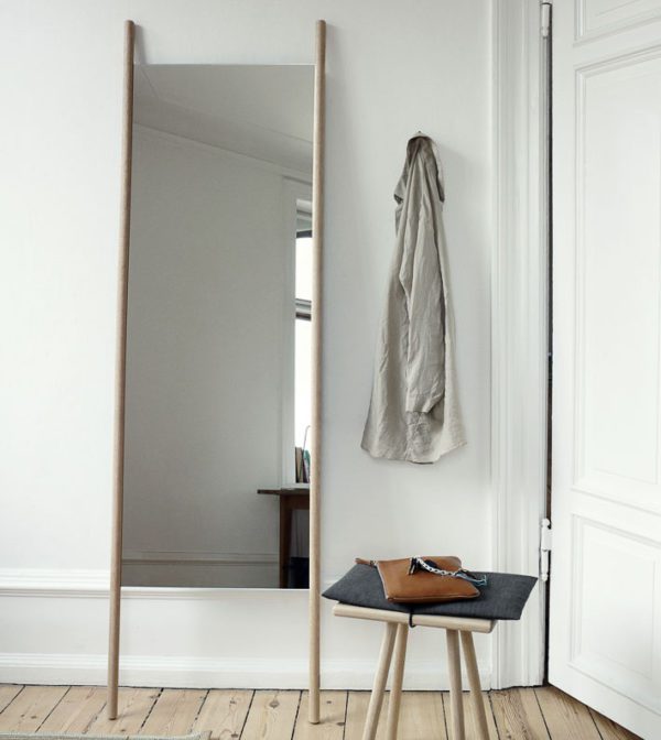 SKAGERAK Georg Floor Mirror, Oak standing against a wall in a bedroom