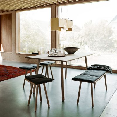 SKAGERAK Georg Dining Table, Oak in a room with large windows