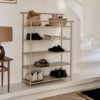 ferm LIVING Dora Rack, Cashmere in a hallway with shoes on it