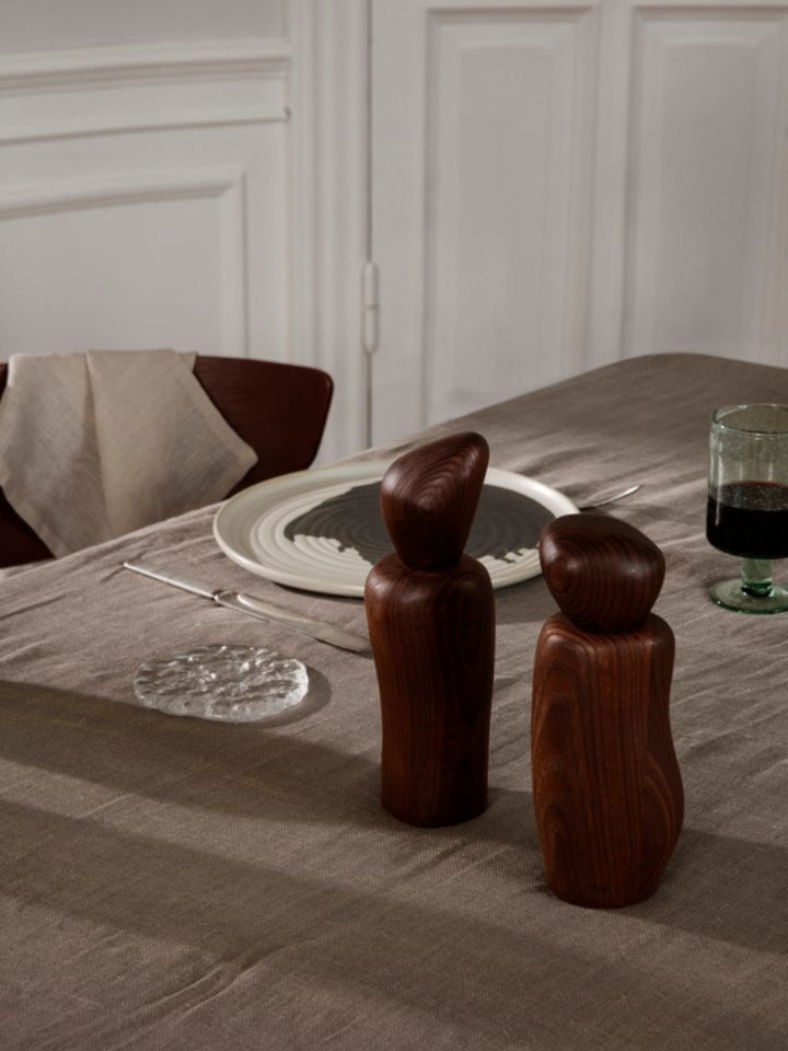 ferm LIVING Cairn Grinder and Pebble Grinders on a dining table