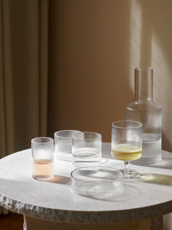 The ferm LIVING Ripple Serving Bowl styled alongside other pieces of the Ripple collection