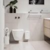 Rim Toilet Bin by Zone Denmark in white in a bathroom