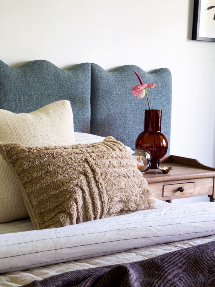 Bed and bedside styled with ferm living crease cushion and citta lazo cushion