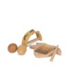 A wooden kids music set consists of xylophone, tambourine, and rattle eggs in a lemon shaped by Konges Slojd.