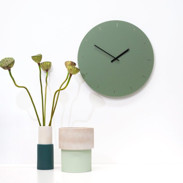 Minimalist clock in olive green with black hands