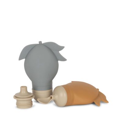 Studio lighting, perspective view of two grey and light brown-coloured, hollow, bulb-shaped kids' spoon and smoothie container.