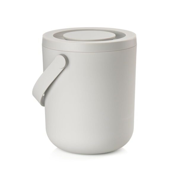 White background, perspective view studio image of a short, grey, cylindrical trash bin with a pail-type handle.