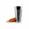 White background, studio lighting, perspective view of a stainless steel, canister-shaped grating bucket with carrots next to it.