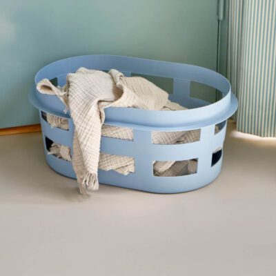 A white scarf in Hay washing laundry basket