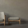 An image of the Seal lounge chair in oak and beige with the matching stool.