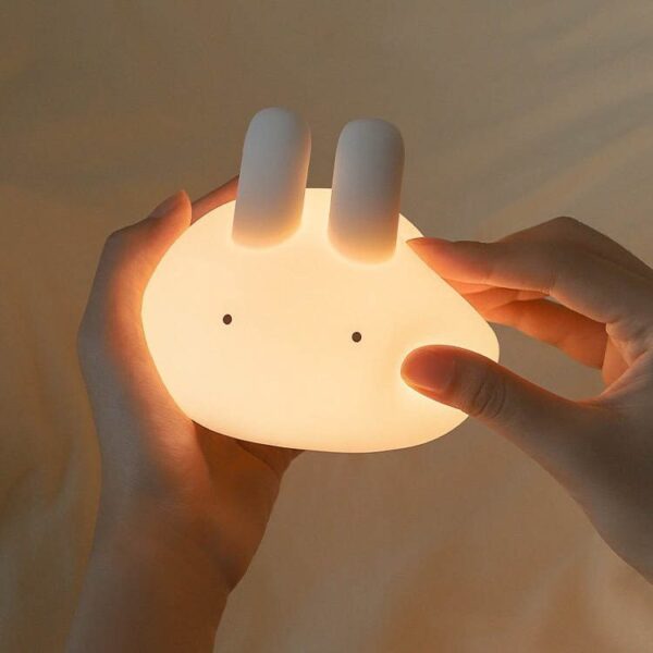 A soft touched Bunny night lamp in white
