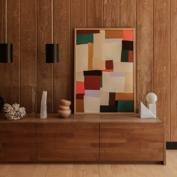 Natural lighting, perspective view of an abstract art print hung on a wall.