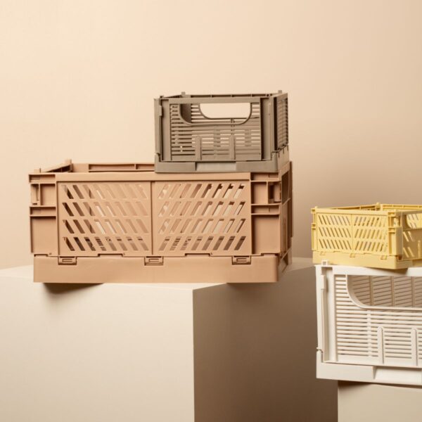 Stack of Collapsible crates in differentes size and various colours including Tuscany, Chalk, taupe and straw