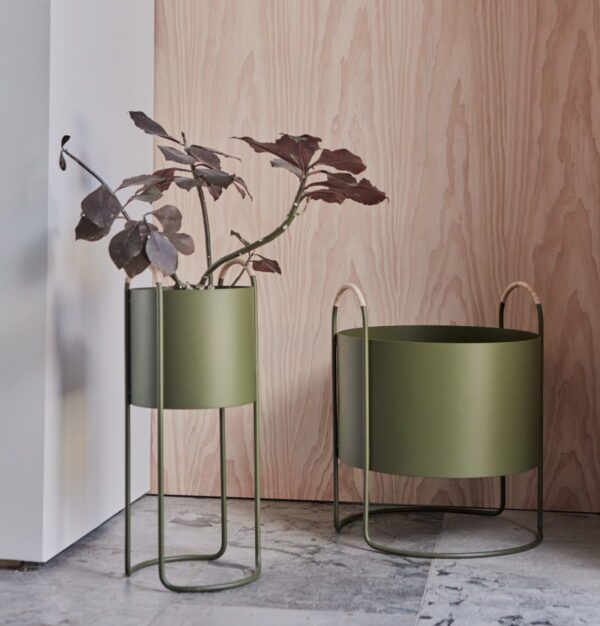 Maki plant box low and Maki plant box from OYOY in olive made of iron with rattan handles.