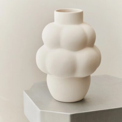 Studio lighting, close up shot of an odd-shaped ceramic vase