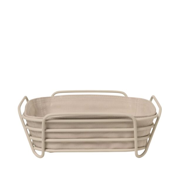 A grill-shaped bread basket with its matching cloth at the center.