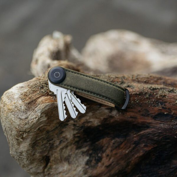 Style image of Orbitkey key chains stores your keys into a silent stack. Made from durable materials and water resistant with secure locking mechanism.