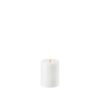 A cylinder-shaped, pillar-type flameless candle