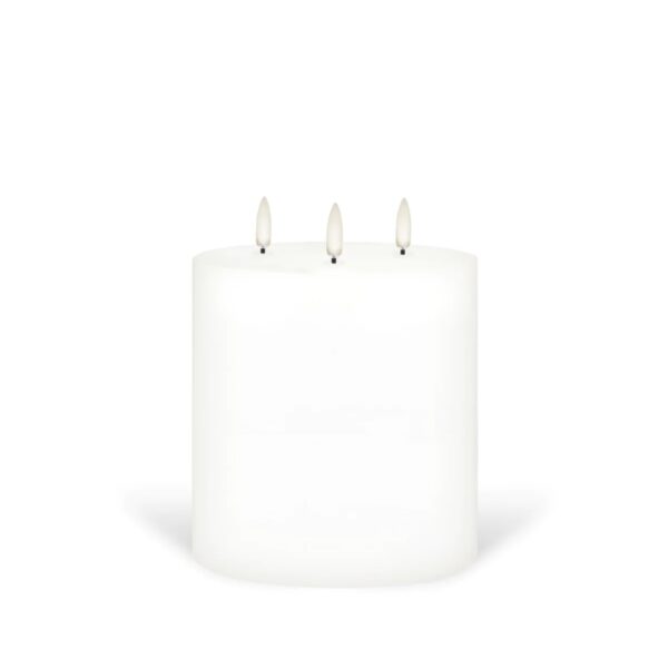 A three-wicked, flameless pillar candle.