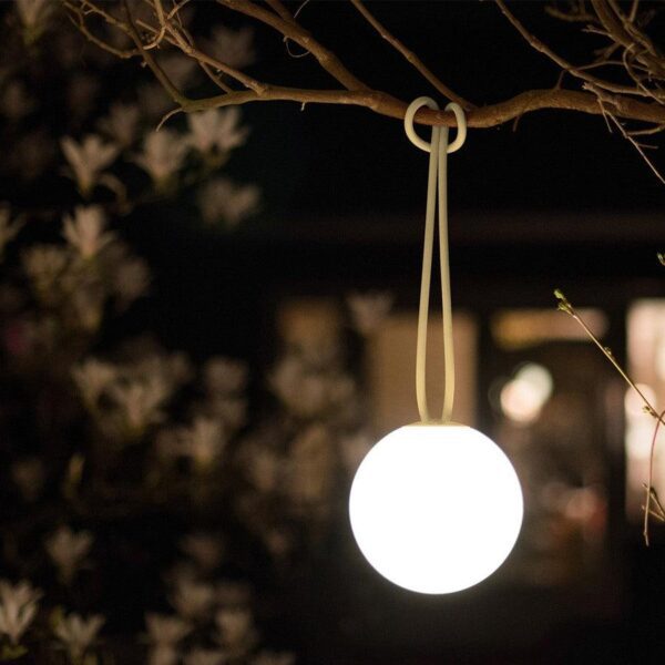 Bolleke portable and rechargeable pendant lamp is designed for indoor and outdoor use.