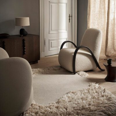 The Buur Lounge Chair in Nordic Boucle off-white is a statement piece in any room.
