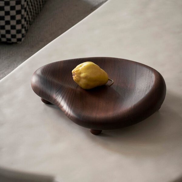 A fruit on the Cairn Centrepiece, from solid, FSC™ certified ash wood that can be used as a decor tray or fruit bowl.