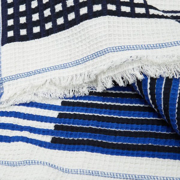 Cotton weaving and hand screen-printing towels by Ma Poesie. This designer single sheet can be used as a couch throw, a bedspread or a beach towel.