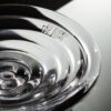 A detailed image of Press medium glass bowl by Tom Dixon.