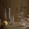 A collection of decorative hand-made glass Press bowl and vase by Tom Dixon.