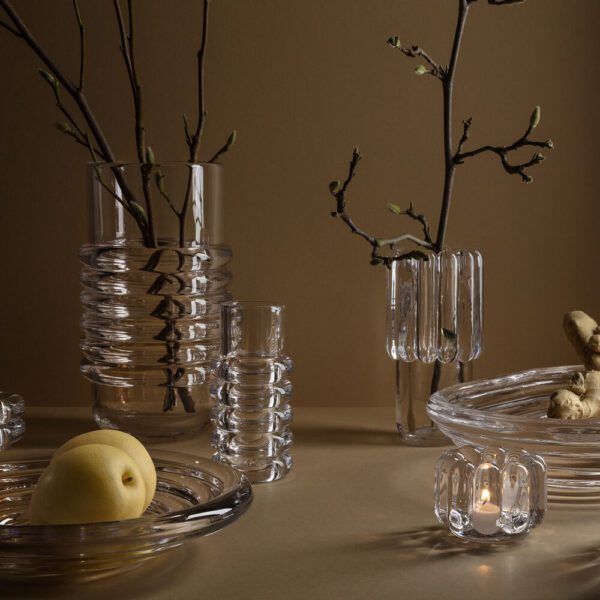 A collection of decorative hand-made glass Press bowl and vase by Tom Dixon.