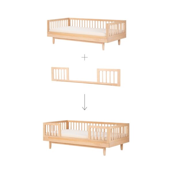 Studio lighting, diagram view of a kids' wooden bed security attachment stacked on top of a wooden bed frame.