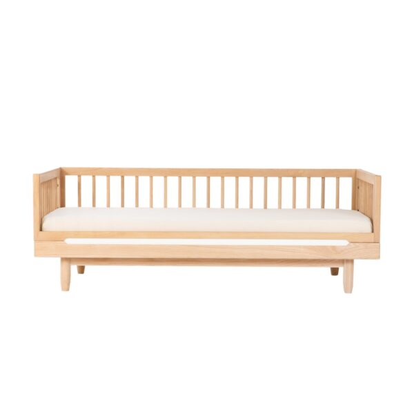 Studio lighting, perspective view of a kids' wooden bed frame.