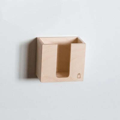 Studio lighting, perspective view of a kids' magnetic wooden storage box.