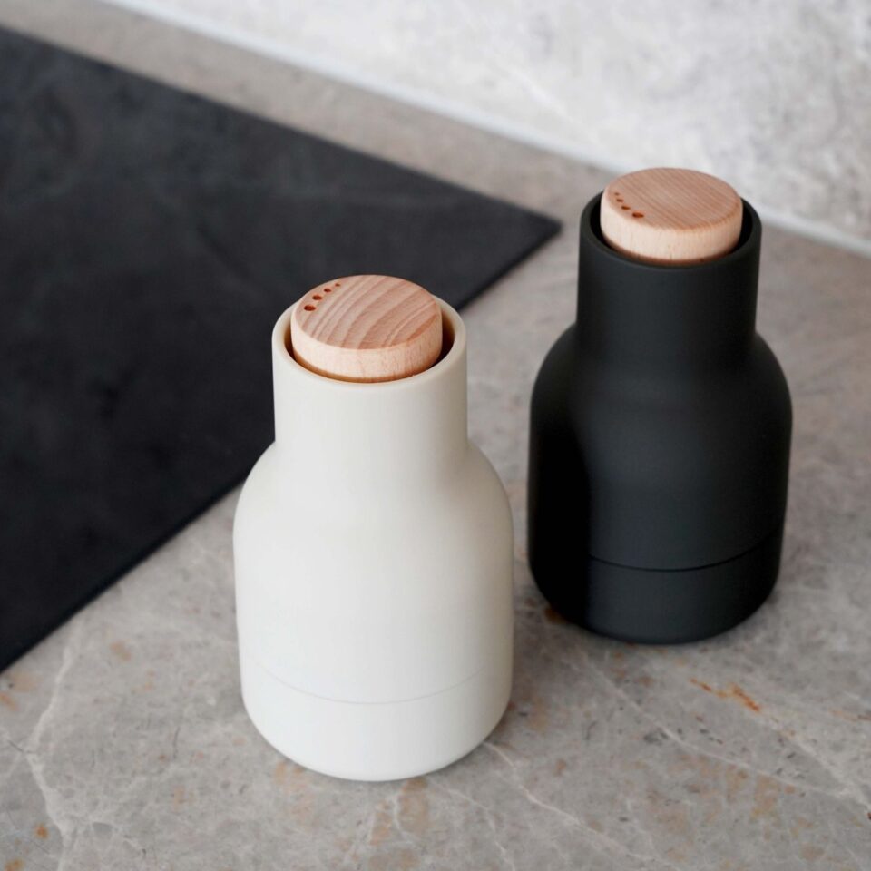 https://www.designstuff.com.au/wp-content/uploads/2023/11/AUDO-CPH-Salt-and-Pepper-Bottle-Grinder-Set-Small-Ash-Carbon-1-960x960.jpg