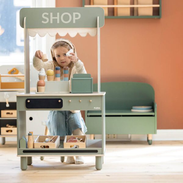 Wooden toy to foster your child's creativity with this versatile playset, allowing them to shift seamlessly between running a grocery store and serving a cafe.